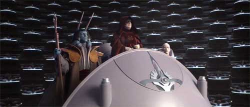 Der Kanzler verkündet im Senat die Abschaffung der Republik und leitet die Herrschaft des Imperiums ein (Star Wars, Episode III: Die Rache der Sith).